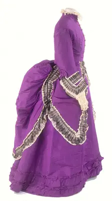 A side view of a fashionable day dress, c1875. Creator: Unknown