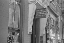 A sign offering apartments for rent, 61st Street between 1st and 3rd Avenues, New York, 1938. Creator: Walker Evans