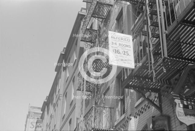 A sign offering apartments for rent, 61st Street between 1st and 3rd Avenues, New York, 1938. Creator: Walker Evans.