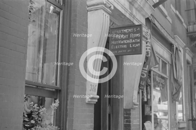 A sign offering apartments for rent, 61st Street between 1st and 3rd Avenues, New York, 1938. Creator: Walker Evans.