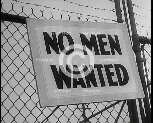 A Sign Hanging on a Fence. Sign Read: 'No Men Wanted', 1929. Creator: British Pathe Ltd.
