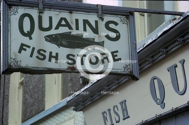 A sign in Youghal, Ireland. Artist: Unknown