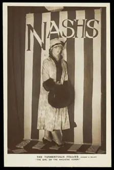 A soldier in drag modelling for "The Timbertown Follies" at a prisoner of war camp..., [1914-1918?]. Creator: Unknown