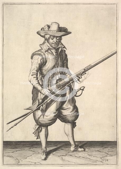A soldier shaking the powder from the top of the pan, from the Musketeers series, plate 19, in.... Creator: Unknown.