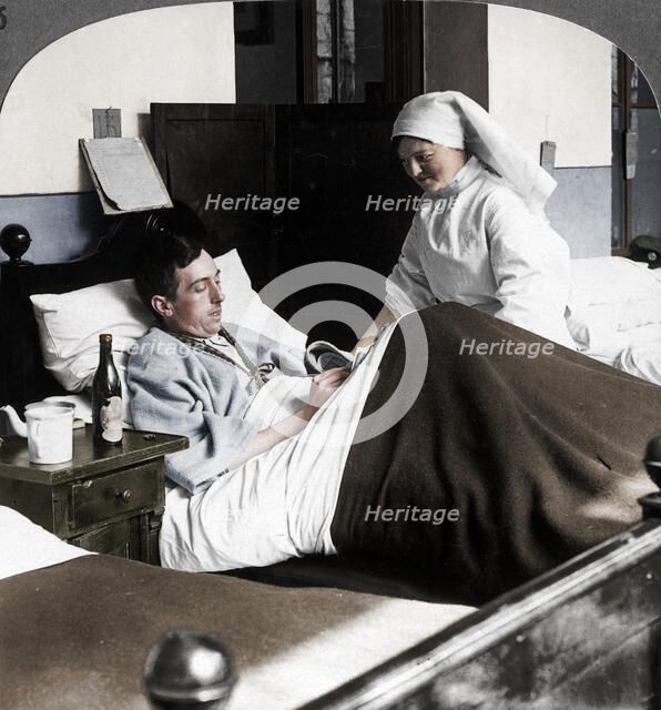 A soldier writing a letter in hospital, World War I, 1914-1918. Artist: Realistic Travels Publishers.