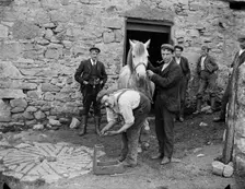 A smith in Fore Street, St Just, Cornwall, 1901. Artist: A Newton
