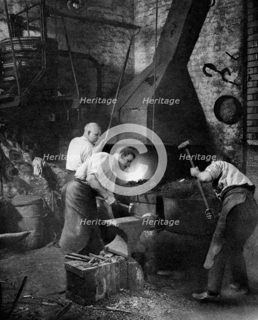 A smithy, St John's Gate, Clerkenwell, London, 1926-1927. Artist: Unknown