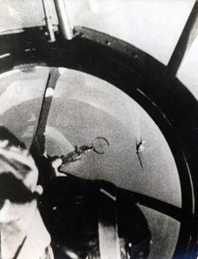 A Spitfire seen from a HE 111K, after diving through the German bomber formation