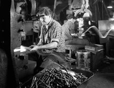 A spring hammer turning drill bits, Footprint Tools, Sheffield, South Yorkshire, 1968. Artist: Michael Walters