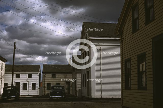 A square with old houses in an old fishing village, Stonington, Conn., 1940. Creator: Jack Delano.
