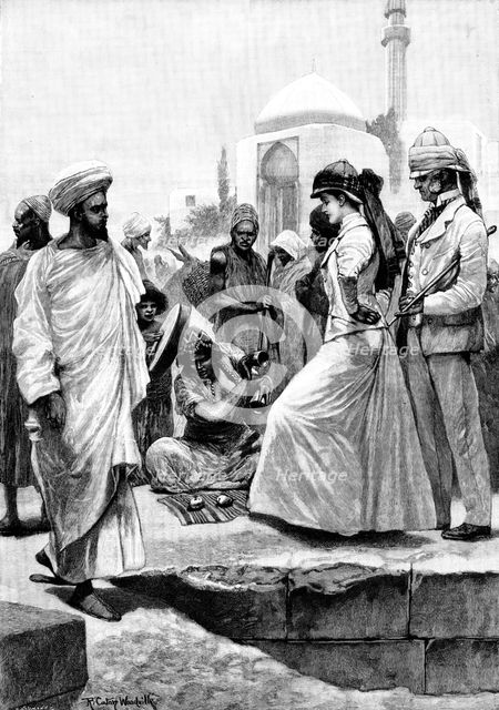 A Street Conjurer in Algiers, 1895. Creator: P Naumann.