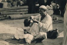 A Street Barber, Cairo, Egypt, 1936