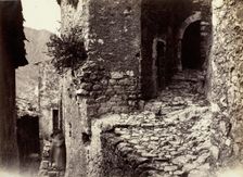 A Street in Sainte-Agnès near Roquebrune, c. 1865. Creator: Charles Nègre