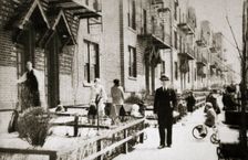 A street in the Borough of Queens, New York, USA, early 1930s. Creator: Unknown