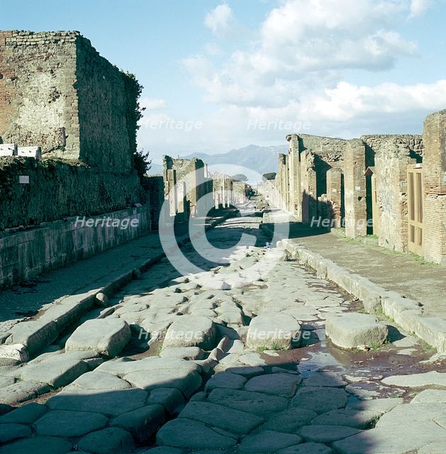 A street in the Roman town of Pompeii, Italy.  Creator: Unknown.