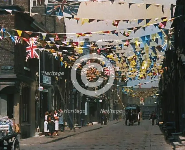 A Street is Decorated With Bunting For the Coronation of George VI, 1937. Creator: British Pathe Ltd.