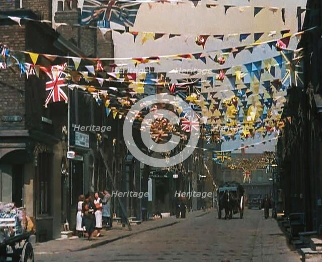 A Street is Decorated With Bunting For the Coronation of George VI, 1937. Creator: British Pathe Ltd.