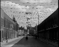 A Street is Decorated With Bunting For the Coronation of George VI, 1937. Creator: British Pathe Ltd