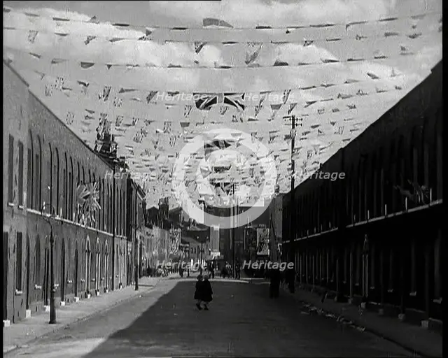 A Street is Decorated With Bunting For the Coronation of George VI, 1937. Creator: British Pathe Ltd.