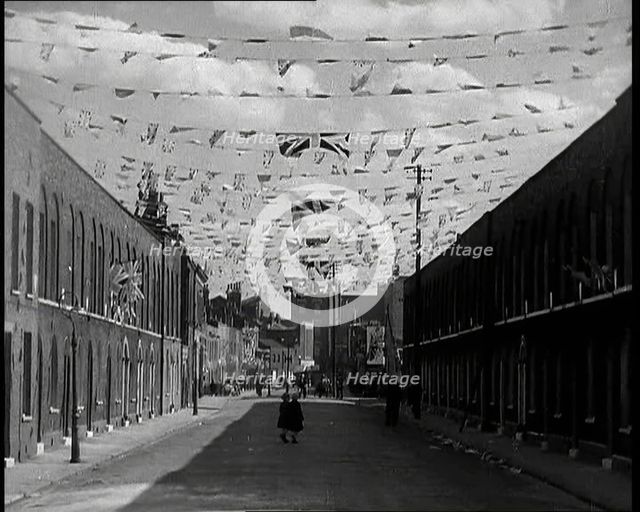 A Street is Decorated With Bunting For the Coronation of George VI, 1937. Creator: British Pathe Ltd.