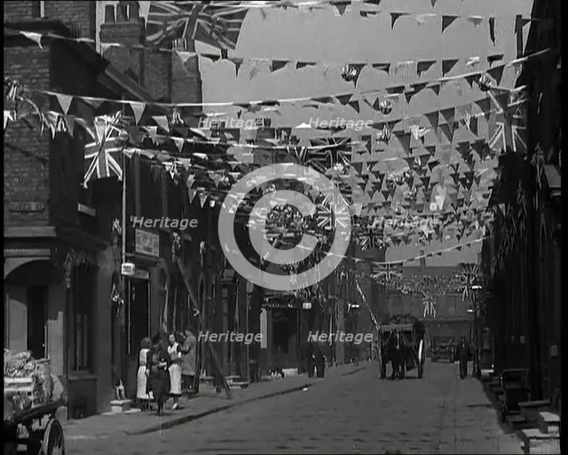 A Street is Decorated With Bunting For the Coronation of George VI, 1937. Creator: British Pathe Ltd.