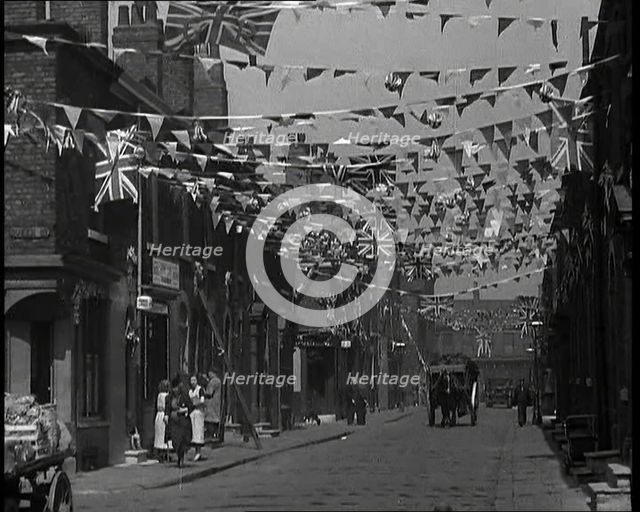 A Street is Decorated With Bunting For the Coronation of George VI, 1937. Creator: British Pathe Ltd.