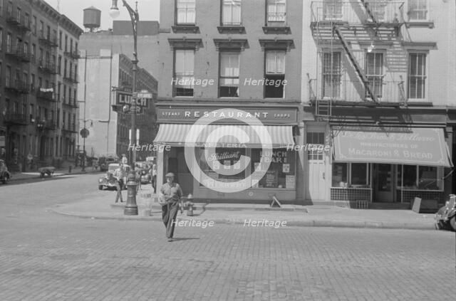 A street scene, 61st Street between 1st and 3rd Avenues, New York, 1938. Creator: Walker Evans.