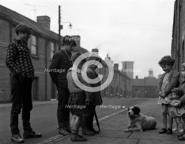 A street scene in Middlesborough, Teesside, 1964.  Creator: Michael Walters.