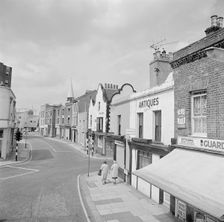 A street view looking from Battersea High Street towards Battersea Church Road, 1962-1964. Creator: John Gay