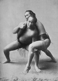 A sumo wrestling bout between a pair of Japanese professionals, 1902