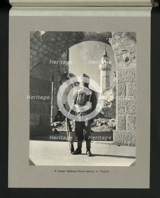 A Sudan Defence Force sentry in Tripoli, 1943. Creators: Colonial Office, Unknown.