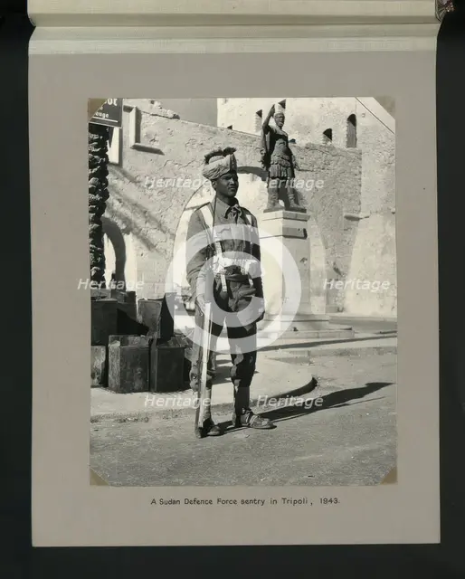 A Sudan Defence Force sentry in Tripoli, 1943. Creators: Colonial Office, Unknown.