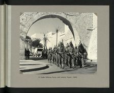 A Sudan Defence Force unit enters Tripoli, 1943. Showing Tripoli Castle on Piazza Italia. Creators: Colonial Office, Unknown