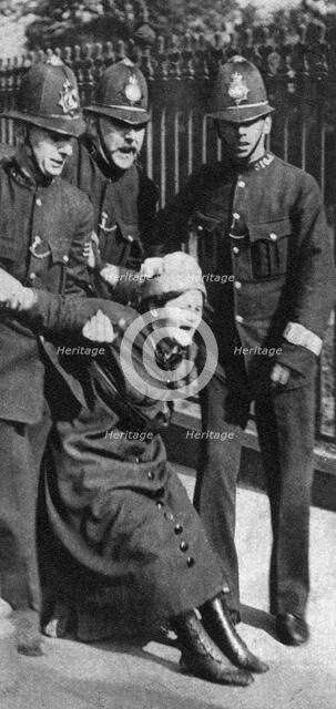 A suffragette being arrested, c1910s (1935). Artist: Unknown