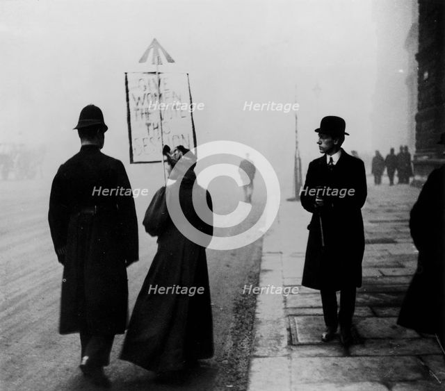 A suffragette demonstrating in Whitehall, London, c1908. Creator: Unknown.