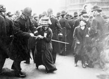 A suffragette struggling with a policeman on Black Friday 18th November 1910