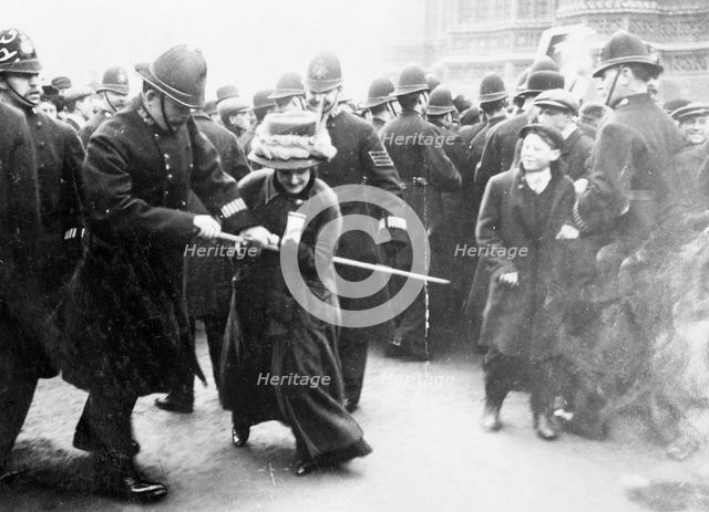 A suffragette struggling with a policeman on 'Black Friday', 18th November 1910. Artist: Unknown