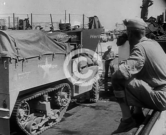 A Supply Truck Backing Into a Supply Depot, 1943. Creator: British Pathe Ltd.