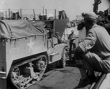 A Supply Truck Backing Into a Supply Depot, 1943. Creator: British Pathe Ltd