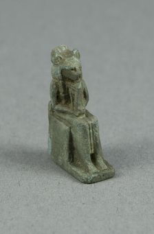 Amulet of a Seated Lion-headed Goddess Holding a Sistrum, possibly Bastet, Egypt, Third... Creator: Unknown