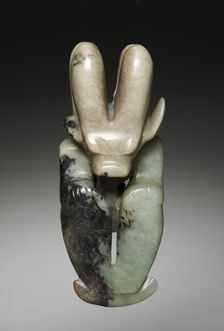Amulet in the Form of a Seated Figure with Bovine Head, c. 4700-2920 BC. Creator: Unknown