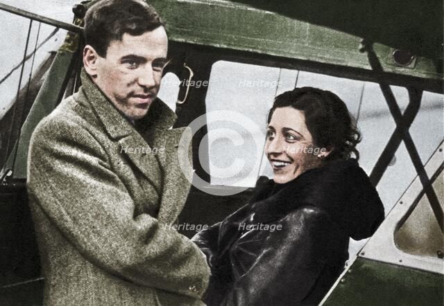 Amy Johnson, British aviator, about to set out for Cape Town, 1932. Creator: Unknown.