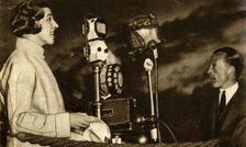 Amy Johnson broadcasting from Croydon Airport, 1930, (1933). Creator: Unknown