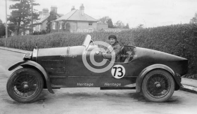 Amy Way seated in a racing car. Artist: Unknown