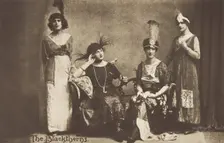 Amateur actors in drag, pose on stage as "The Blackthorns", (between 1910 and 1919?). Creator: Unknown