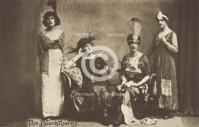 Amateur actors in drag, pose on stage as "The Blackthorns", (between 1910 and 1919?). Creator: Unknown.