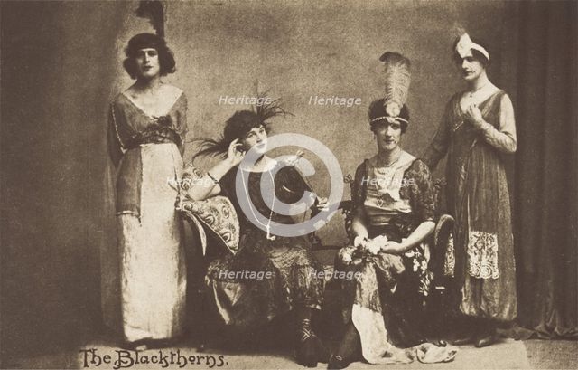 Amateur actors in drag, pose on stage as "The Blackthorns", (between 1910 and 1919?). Creator: Unknown.
