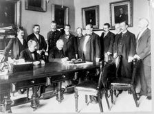 Ambassador Cambon signing the Peace Protocol, c1898. Creator: Frances Benjamin Johnston