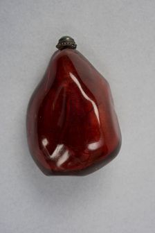 Amber snuff bottle of natural pebble form, China, Qing dynasty, 1644-1911. Creator: Unknown