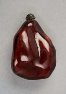 Amber snuff bottle of natural pebble form, China, Qing dynasty, 1644-1911. Creator: Unknown